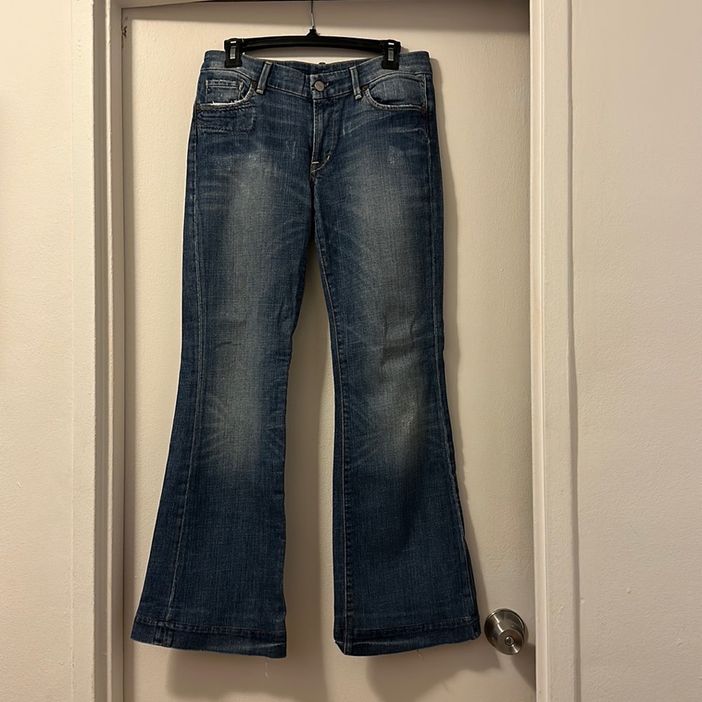 Lightly worn Citizens of Humanity blue distressed wide leg/ bootcut jeans